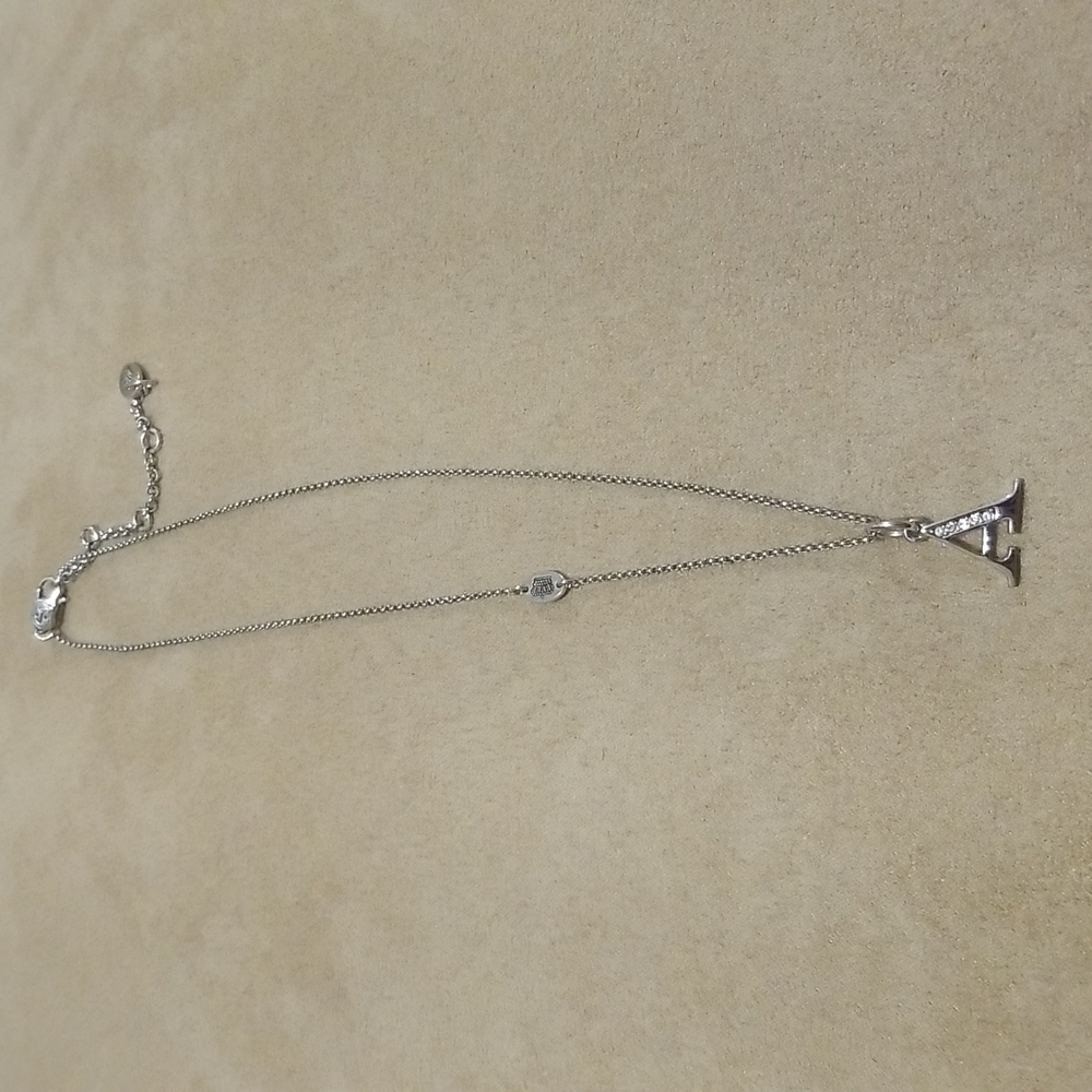 Juicy Couture A initial crystal silver plated necklace worn once.